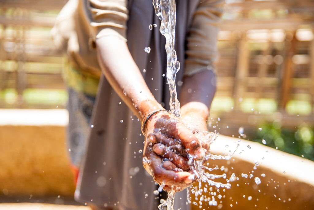 washing hands with clean water at Lifewater International
